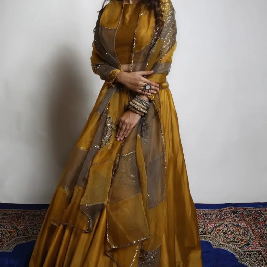 Mustard yellow silk lehenga with organza dupatta – traditional wear for women, available at our online clothing store